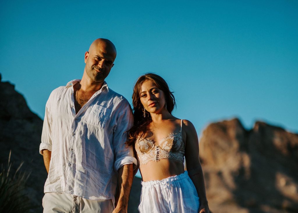 Jaime and Yonatan Elkayam at golden hour in the desert
