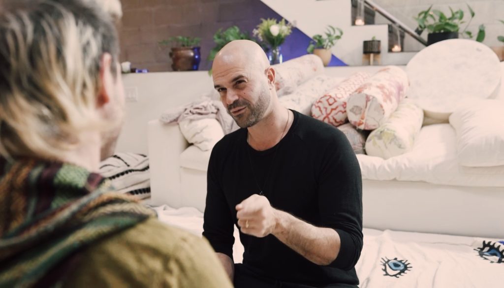 Yonatan Elkayam in a coaching conversation in the warm Word of Mouth loft